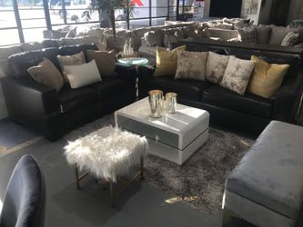 Gray leather sofa and loveseat