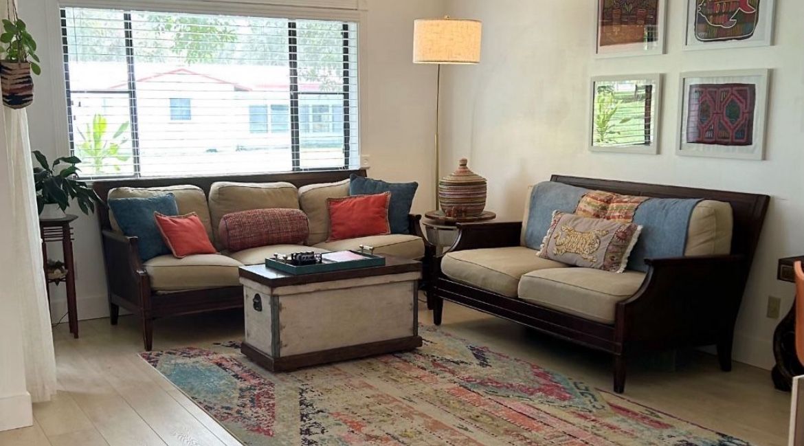 2 Bernhardt sofas from the Martha Stewart collection in walnut and rattan frame