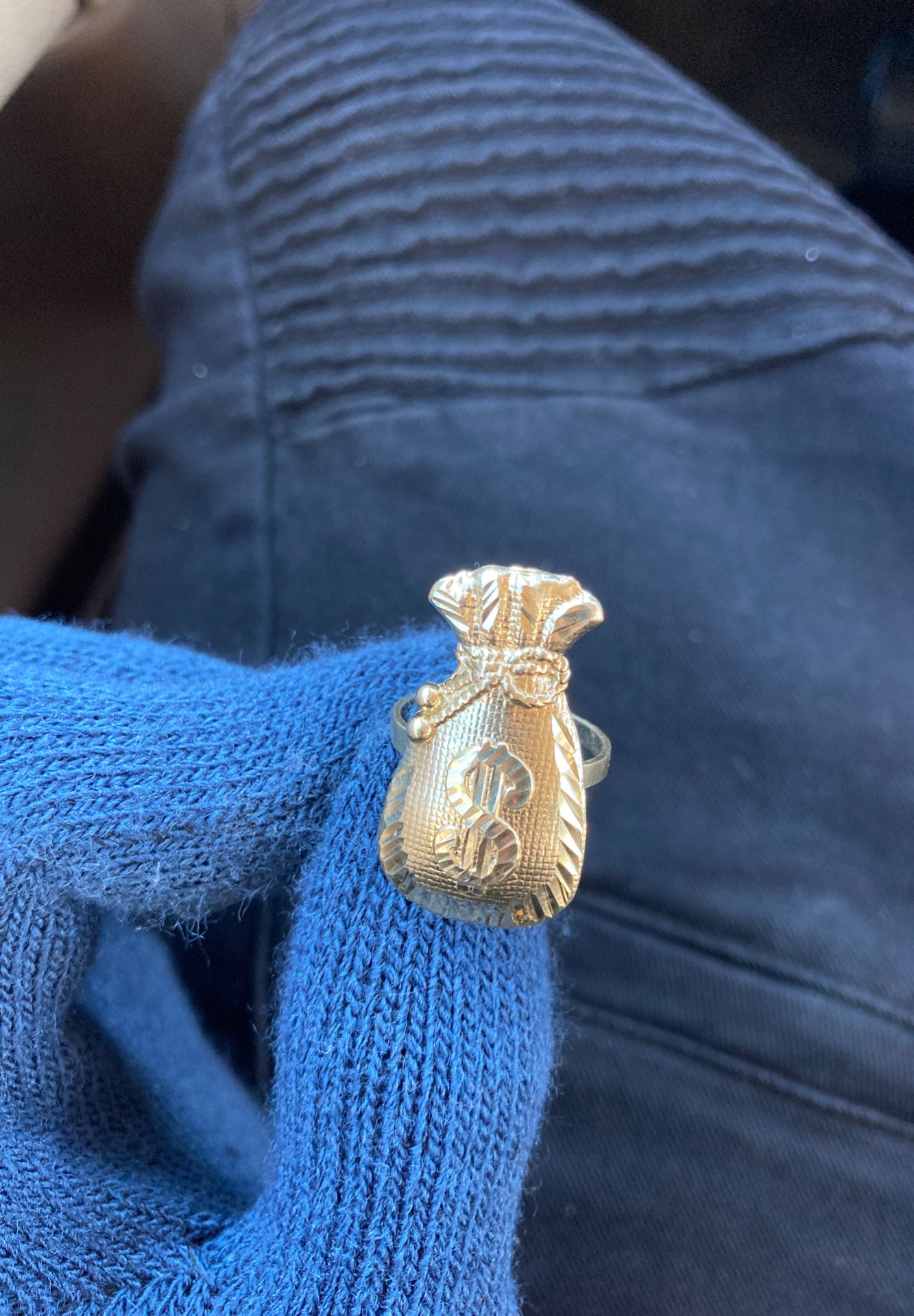 Gold money bag ring