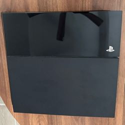 Excellent condition bundle — PS4 original model + 2 controllers + power cable + six popular games.  $180
