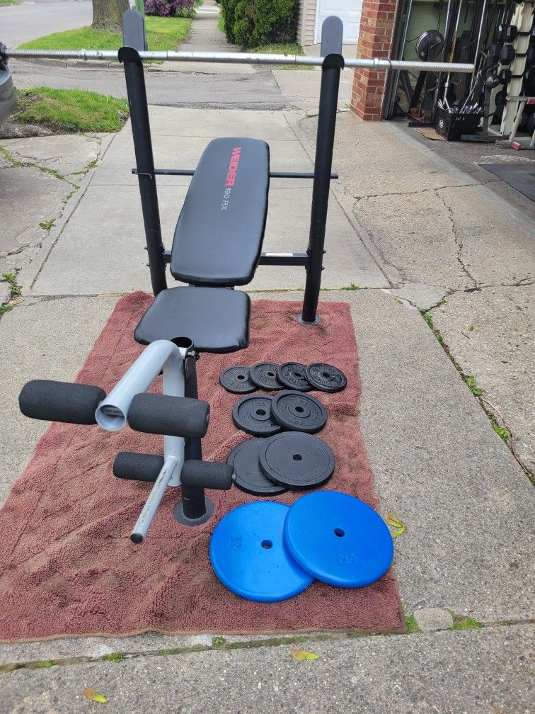 98lbs WEIDER WEIGHT BENCH WITH LEG EXTENSION AND 1