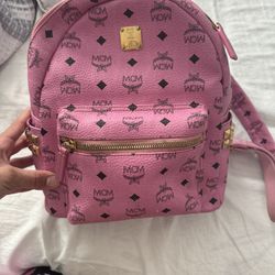 pink mcm bag with pink off whites 
