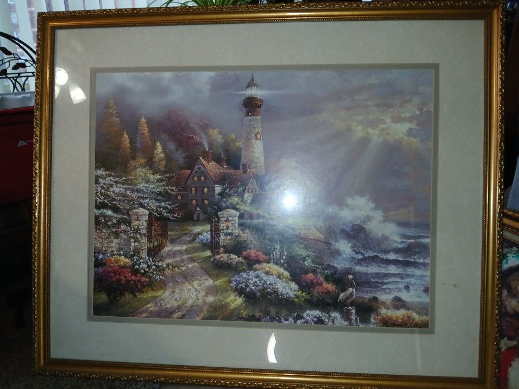 Coastal Splendor Gold Framed Seaside Lighthouse Large Art Print James Lee 32x26
This beautiful art print by James Lee depicts a serene seaside scene