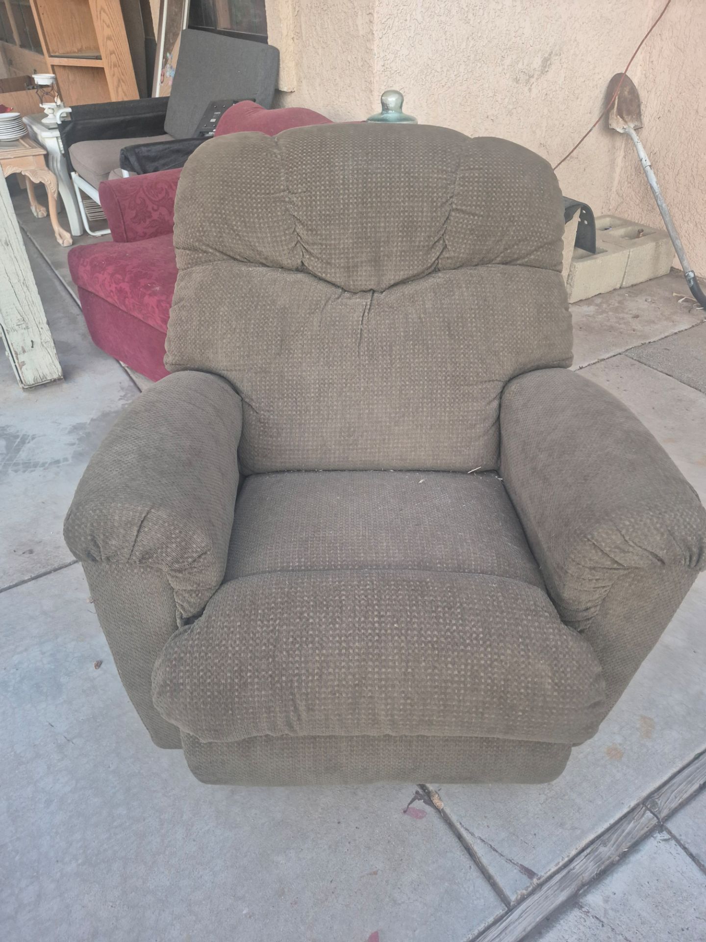 La-Z-Boy recliner featuring brown patterned fabric.