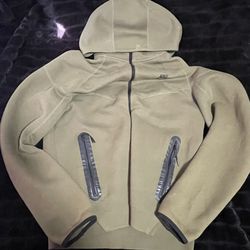 olive green nike tech jacket