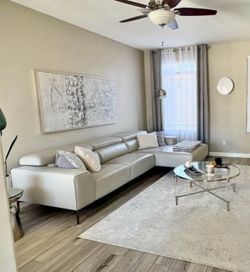 3 seat Leather sectional wide 127 inches long