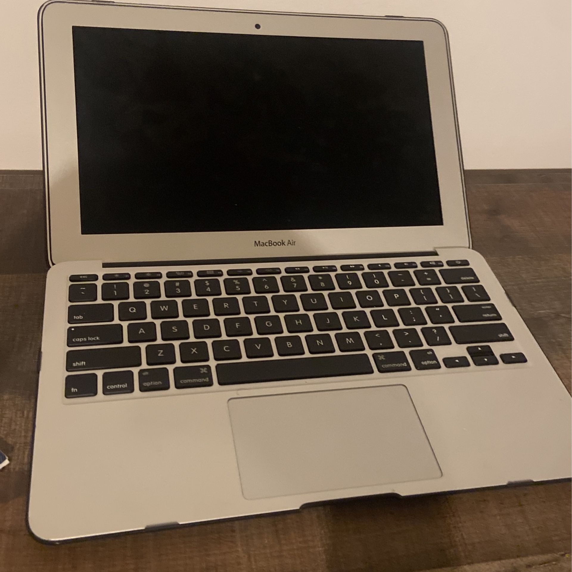 Macbook Air granddaughter forced me to get it but I don't like it 