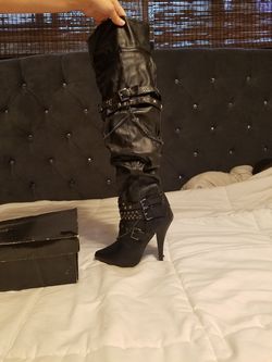 Black thigh high boots