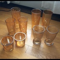 Lot of 16 Peach Orange Vintage Glasses Cups  3 tallest 6 1/2” 1 goblet 6”   9 middle 5” 1 flowered 4”  2 smallest 3”