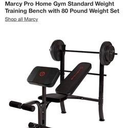 marcy bench press with bar and vinyl plates