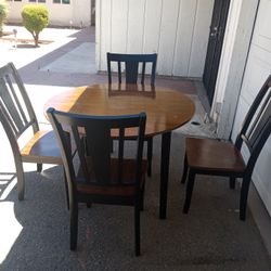 TABLE AND FOUR CHAIRS.  