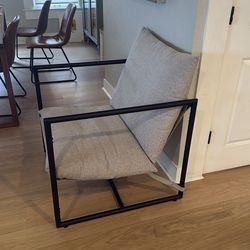 Two decorative sling chairs