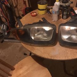 Headlights Pair 05 Chevrolet Cavalier 