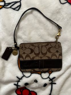 Coach monogram wristlet