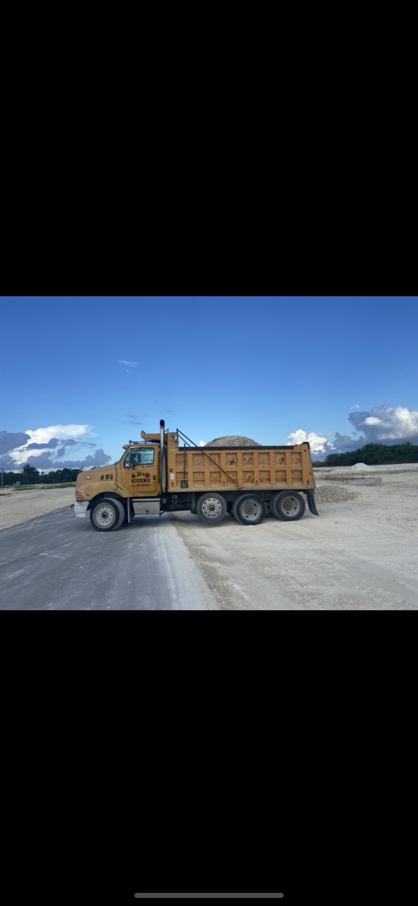 Bobcat And Dump Truck