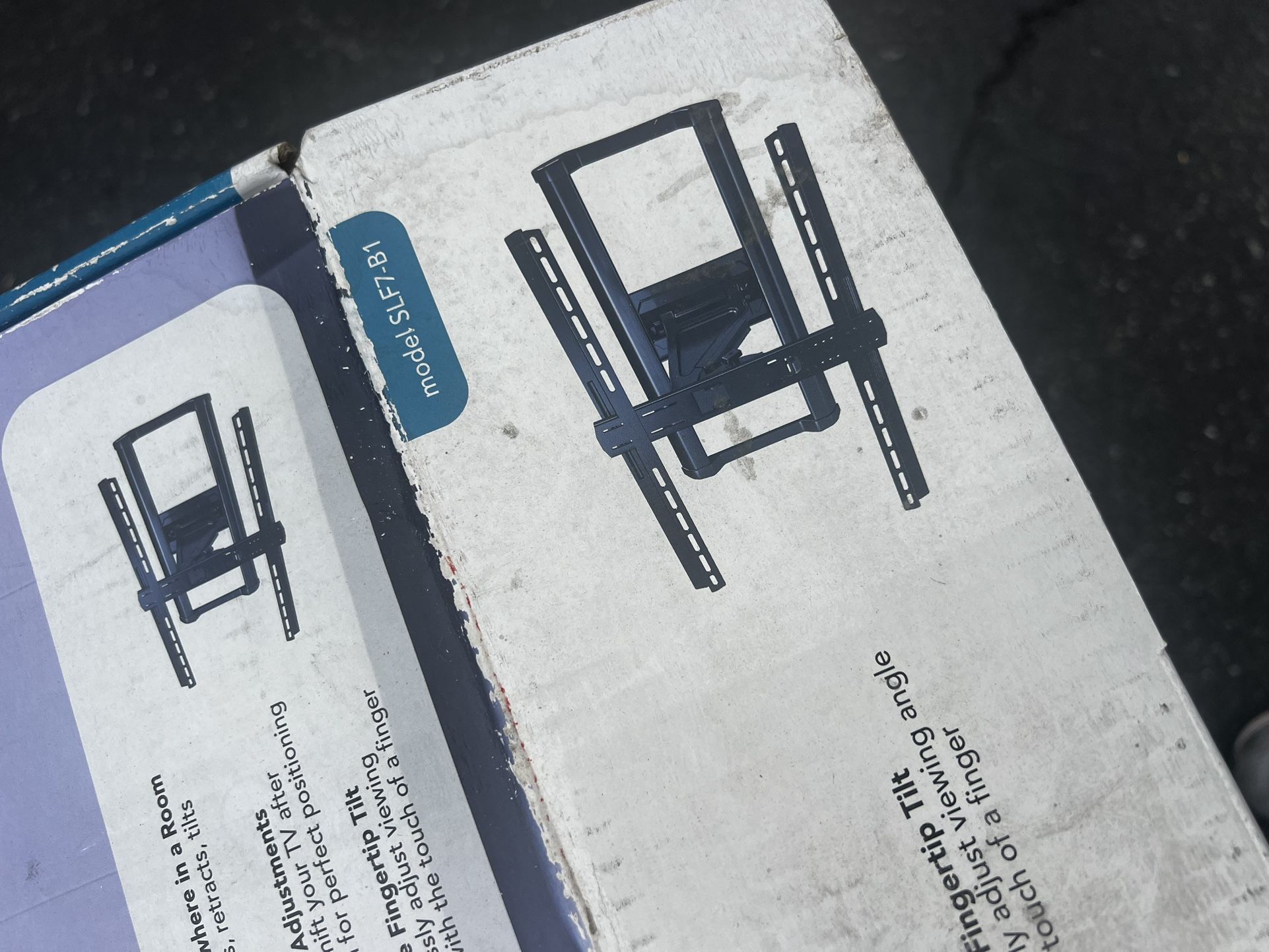 Fingertip Tilt" TV mount with the model number SLF7-B1.