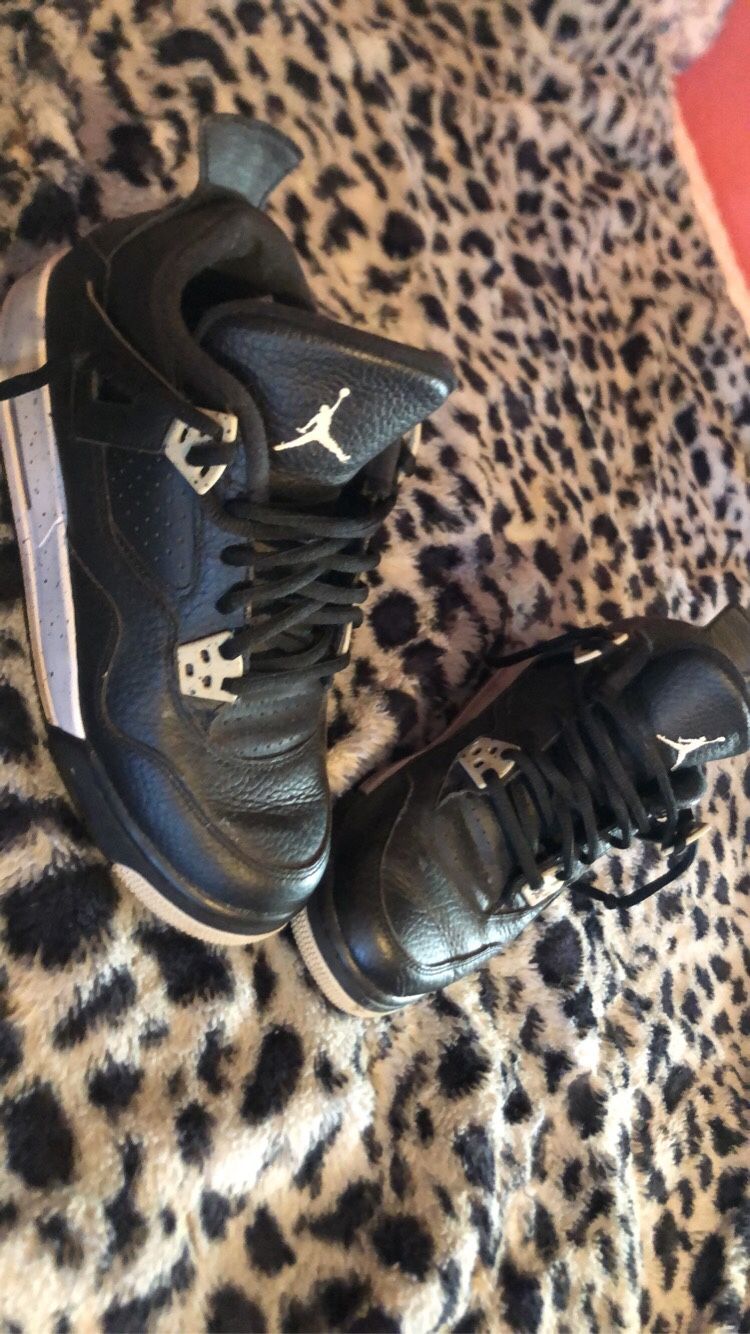 Black gray and white Jordans size 5 1/2 kids