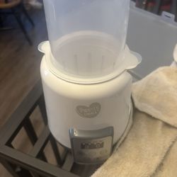 Free Parents Choice Bottle Warmer 