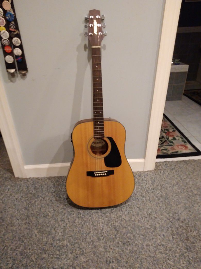 PEAVEY ACOUSTIC GUITAR. WITH ELECTRIC PICK UP     150.00. OBO