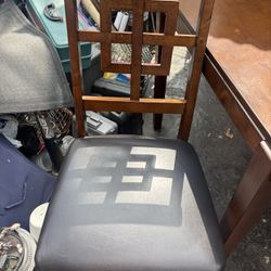 Wooden Table With Three Chairs