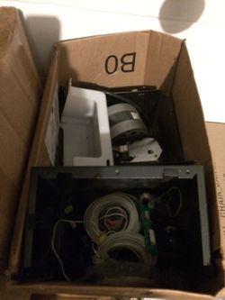 Garage door parts. Housing/motor/rails/opener and more