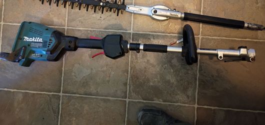 Makita 36v hedge trimmer with telescoping attachment., 2 18 v batteries, and charger.