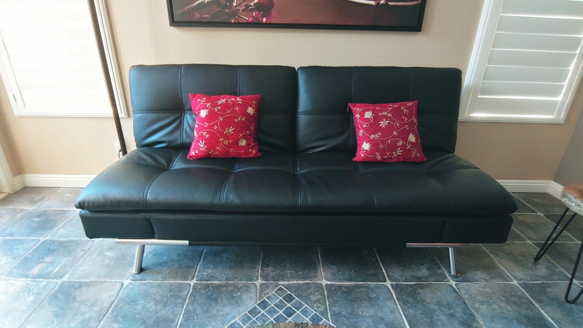 Beautiful black leather sofa futon