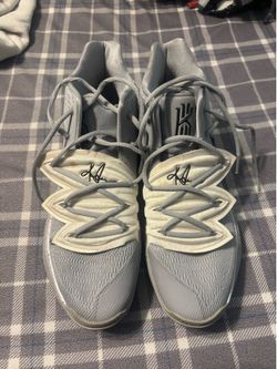 Size 12 Kyries grey