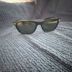New Wayfarer Raybans Black Frame And Black Polarized Lenses.