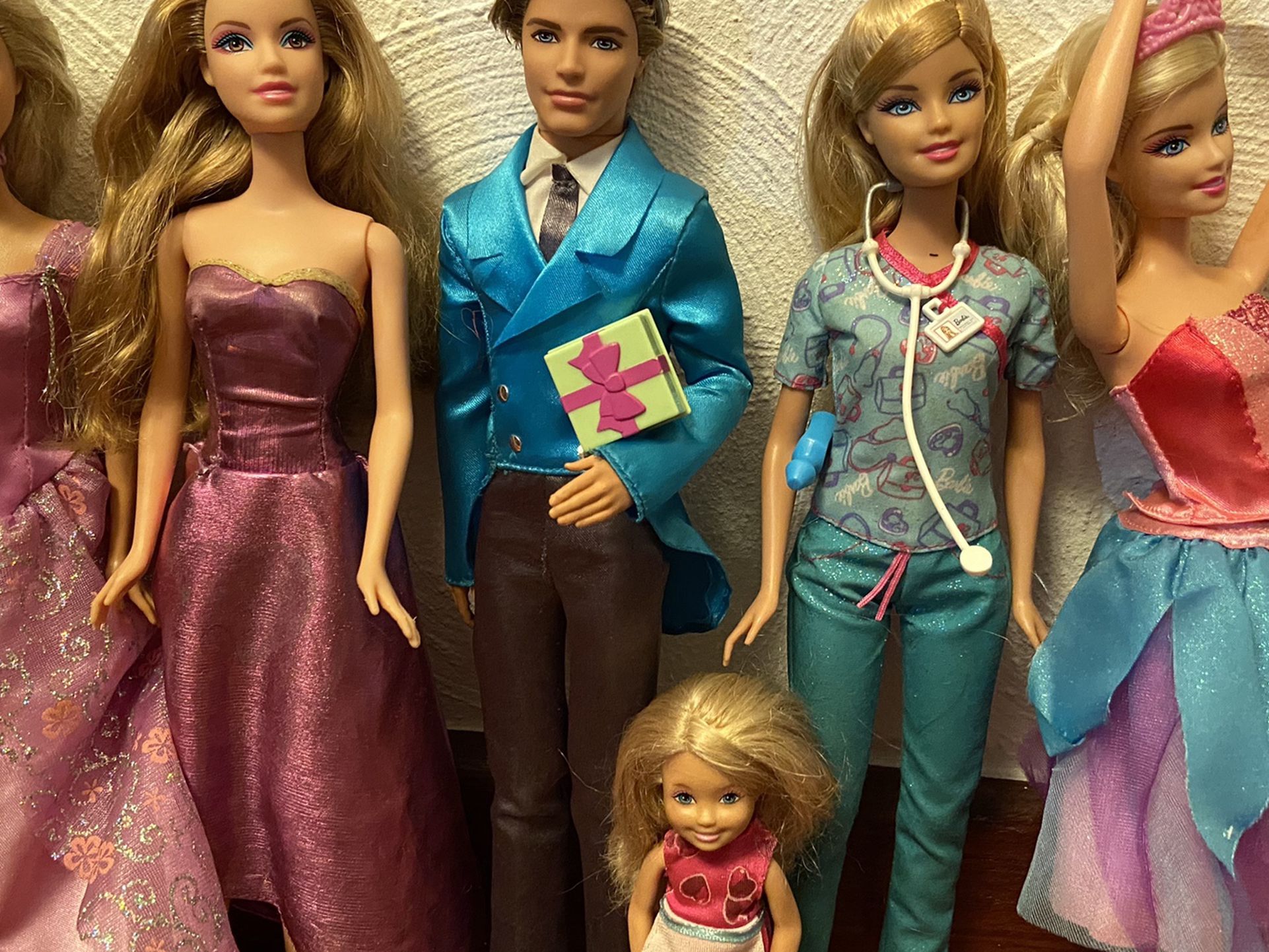 6 Barbie Dolls All With Clothes And Shoes (Well Taken Care Off)