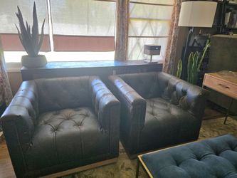 2 Four Hands swivel Destroyed leather chairs