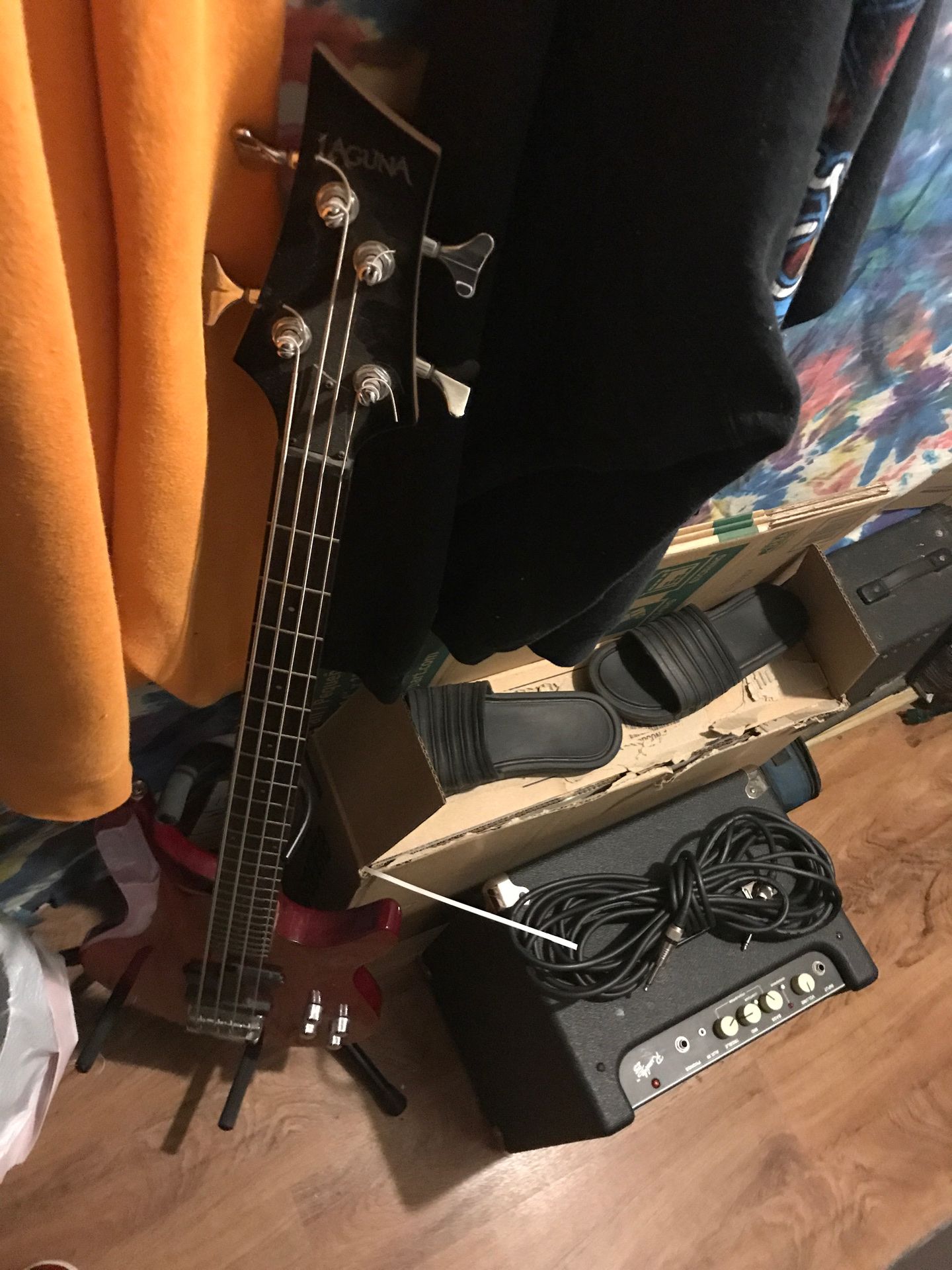 Laguna bass guitar with amp and cord will trade for a newer iPhone or equal value