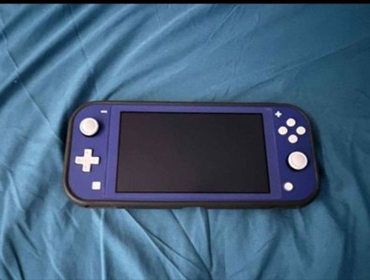 Nintendo Switch lite With 4 Games