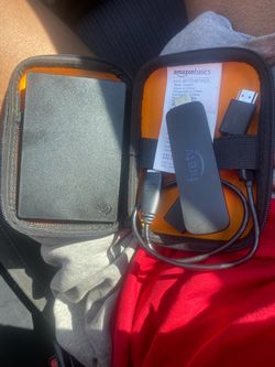 A fire stick and storage block with 1000 GB on it