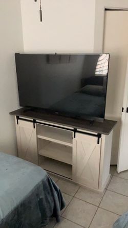 tv stand and tv 55 in.