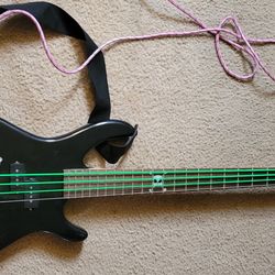Squier MB4 skull design bass guitar.