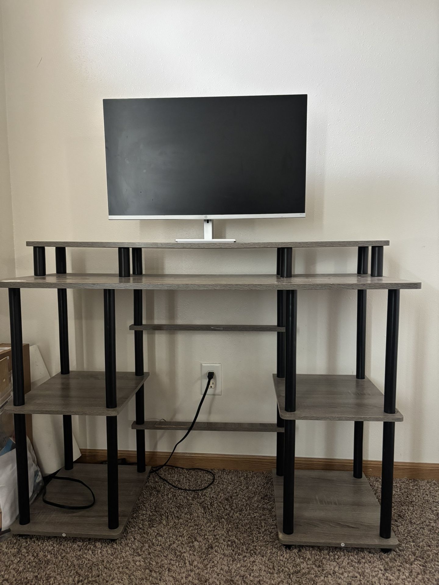 A Desk And Monitor 
