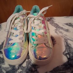 Kidpik holographic iridescent sneakers.
