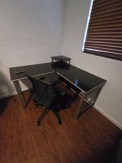 Black L-Shaped Desk with Office Chair