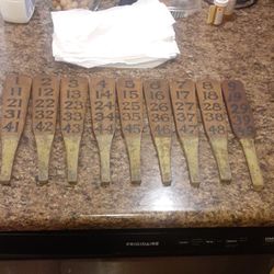 Antique wooden circus paddles