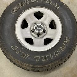 Jeep 15" Steel Wheel With 30x9.5 Tire.
