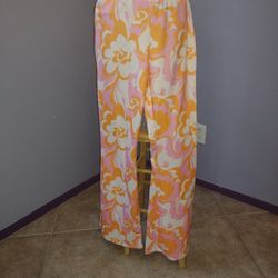 Floral pattern multicolor leggings with bell bottoms size medium 
95% polyester and 5% spandex 
