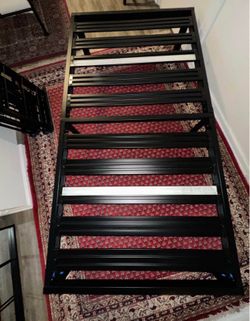 Metal twin platform-style bed frame  Gently used. Pet-free home.  PICKUP Logan square