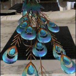 Brand new never used metal peacock with gems for indoor outdoor use