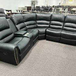 New Reclining Sectional.  Black Leather.  111” X 98”.  Free Delivery!