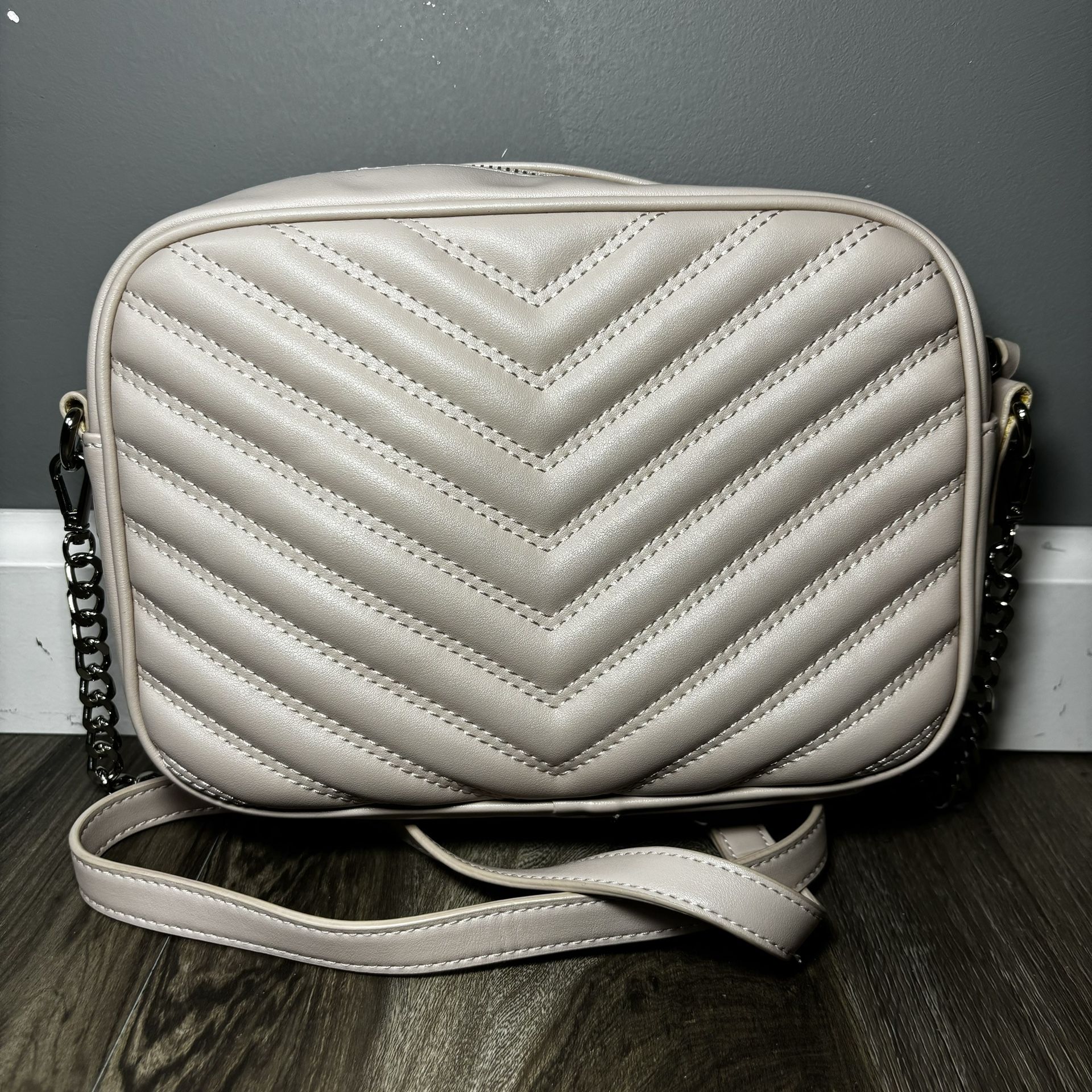express quilted crossbody bag