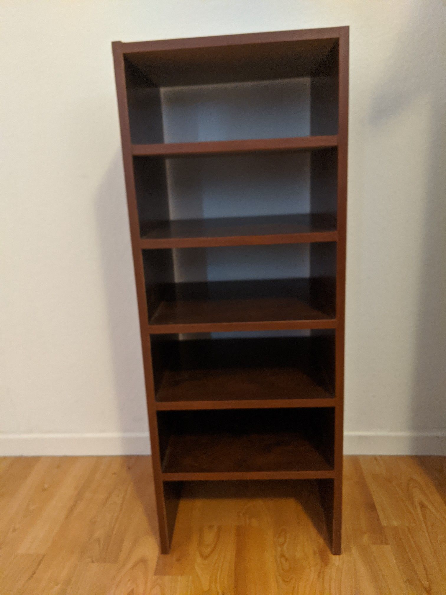 Small wooden shelf approximately 2 ft tall