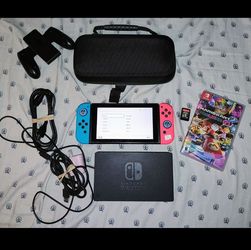 Nintendo switch bundle with brand new joycons. 2 games and 64gb Microsd card.