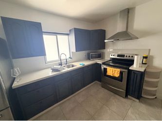 Used kitchen cabinets with countertop