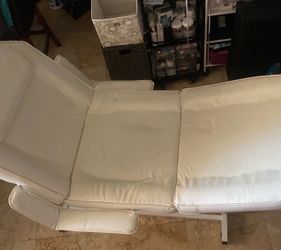 White esthetician, tattoo , waxing chair